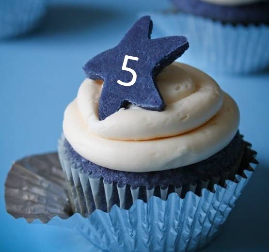 Cupcake with blue star and number 5 on top